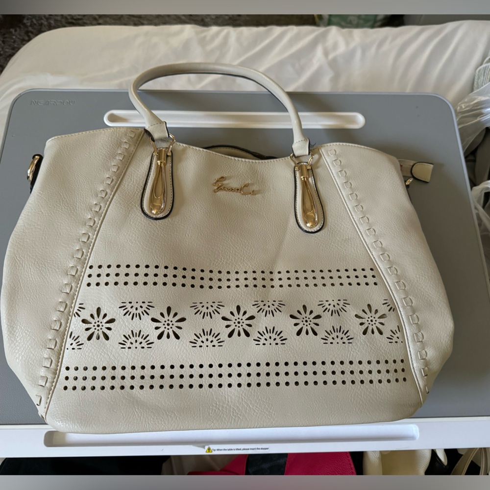 Gussaci cream colored purse mint condition
